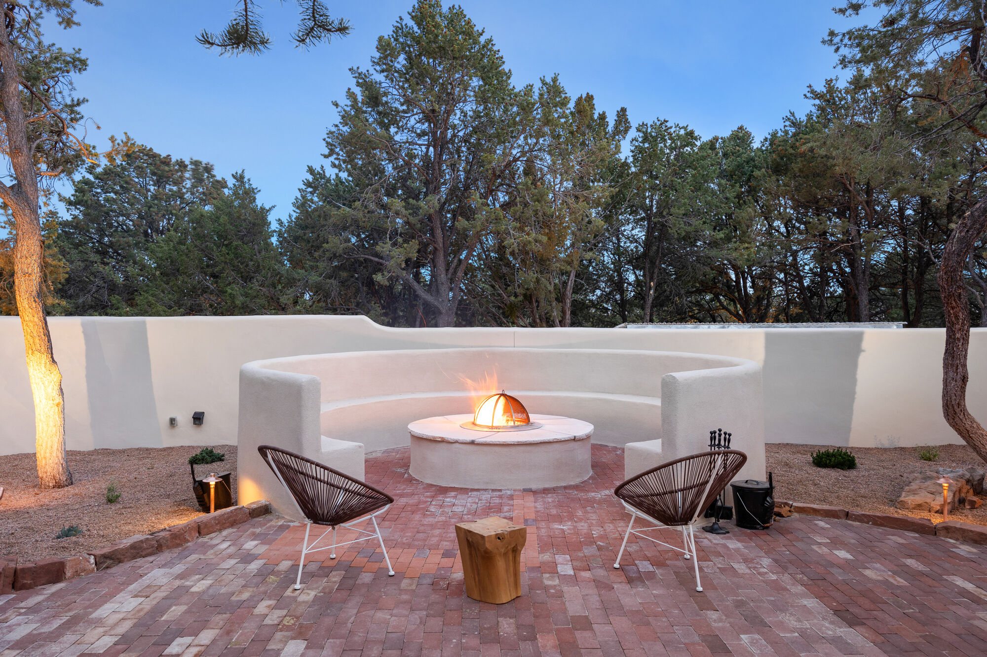 Casa de Camino firepit courtyard at dusk