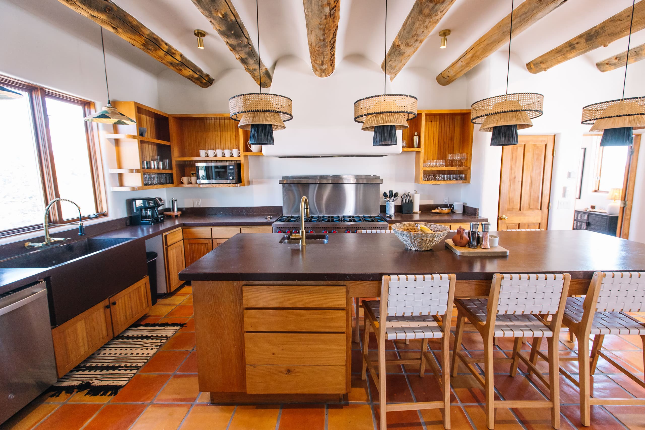Kitchen with oversized island and commercial range