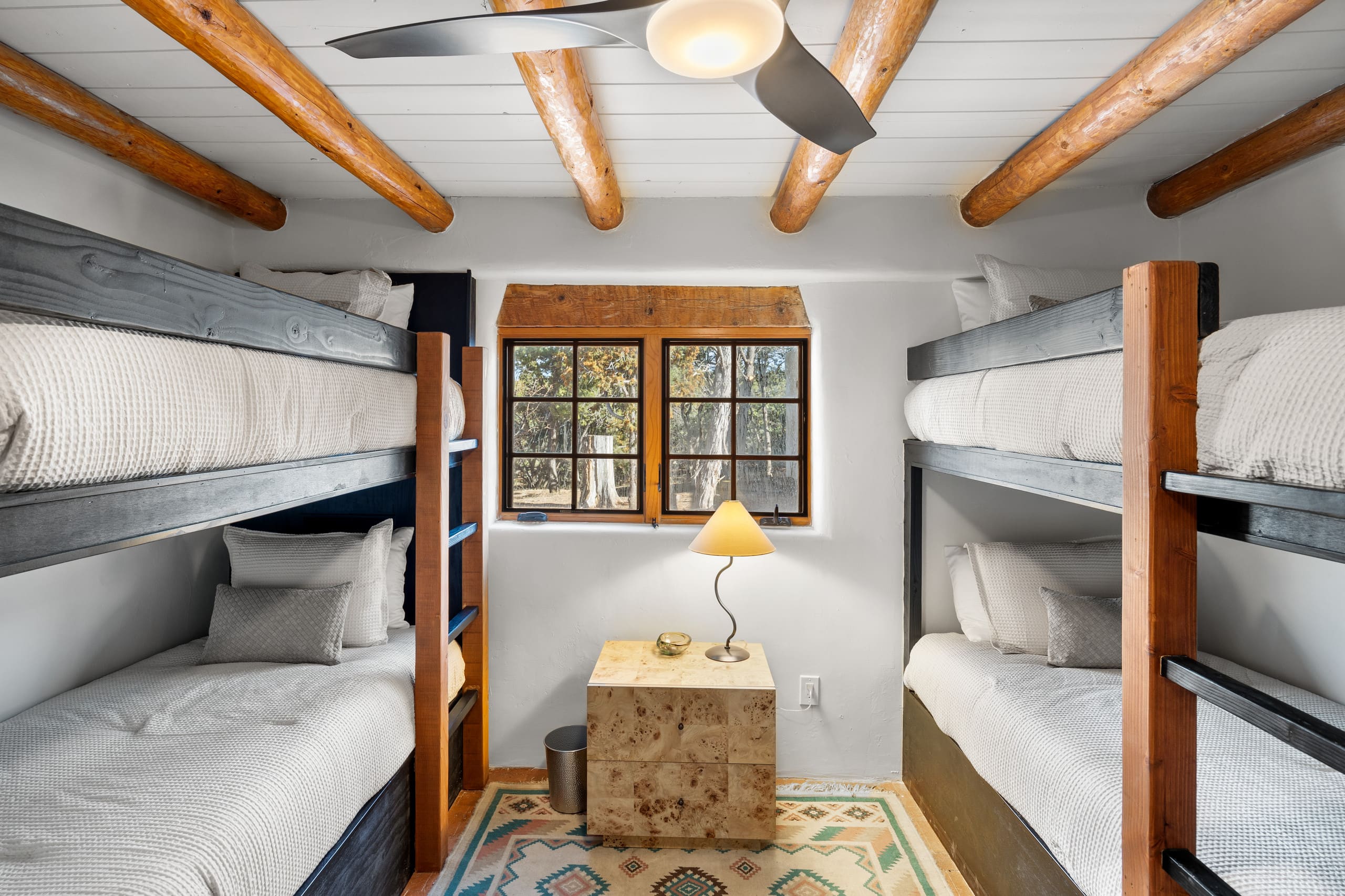 Bunk room with four custom twin bunks