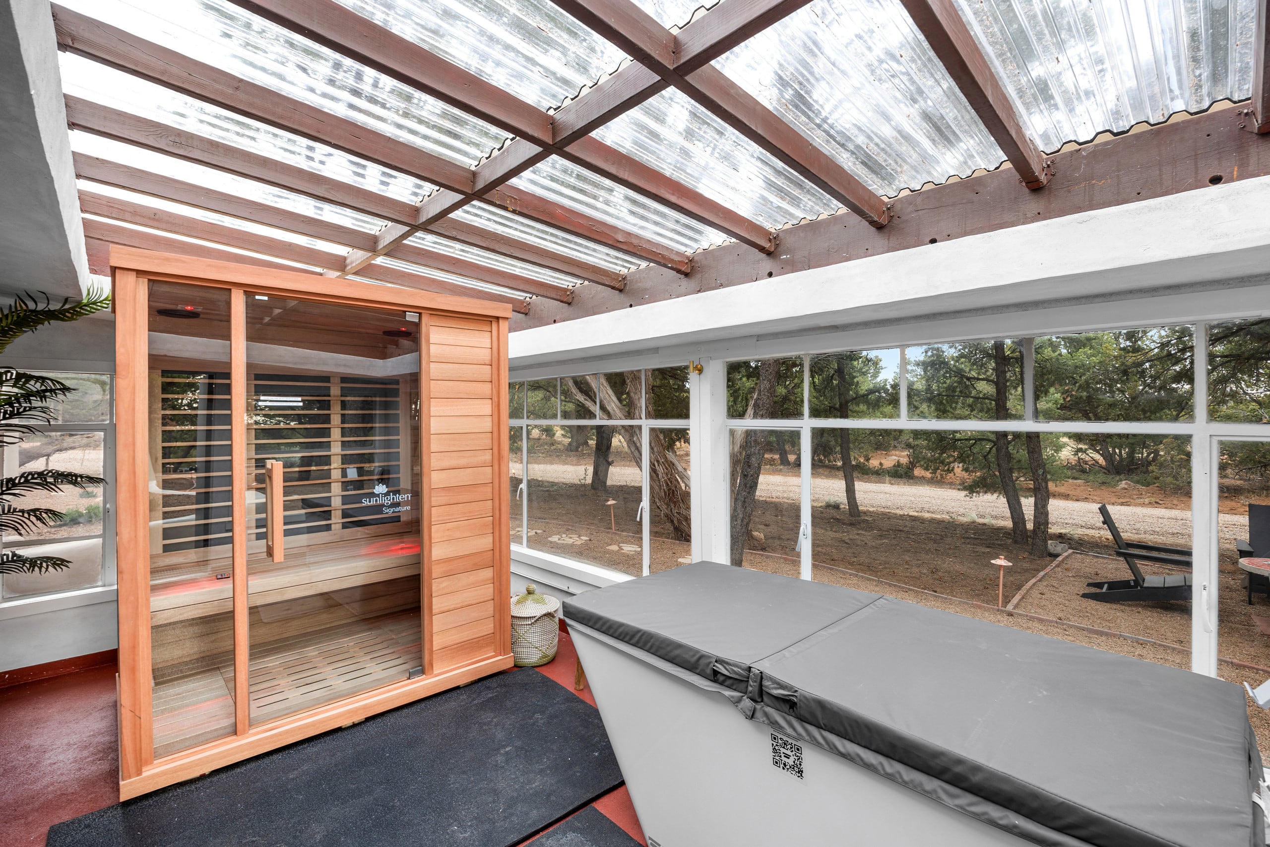 Infrared sauna in the glass-roofed sunroom